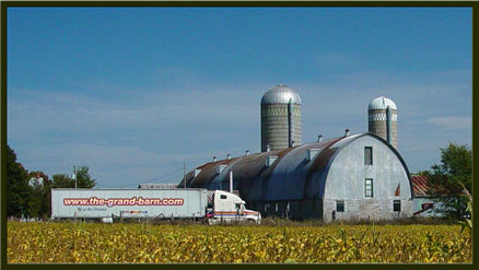 Angled view of The Grand Barn and 18 wheeler