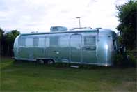 The Airstream is one of several trailers available for rent, here at the grand barn